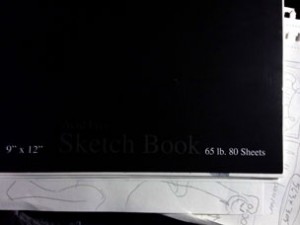 Cheap, dollar-store sketchbook = priceless. Well, a dollar, actually.